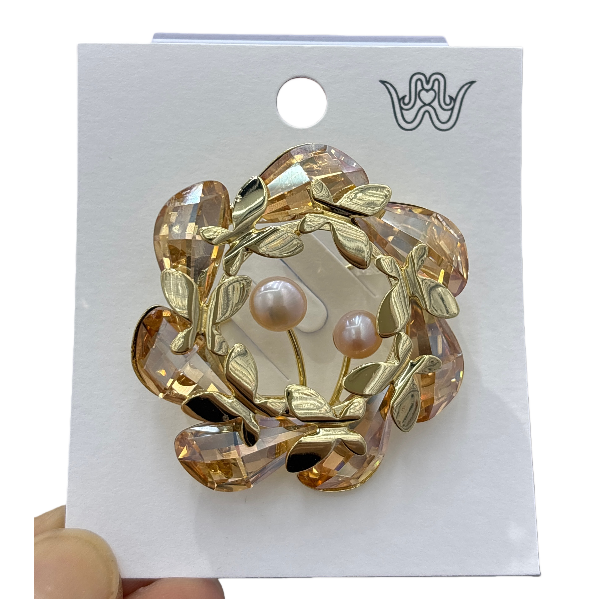 تحتوي الاوراق الذهبية العنبر الكريستال على اثنين من اللؤلؤ في منتصف الدبوس Item Picture