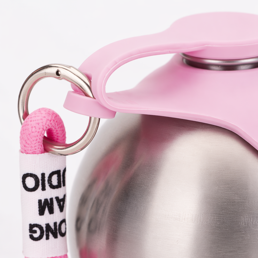 The pink silicone lid stainless steel spherical water cup features a portable and simple design for heat and cold preservation Application Scenario
