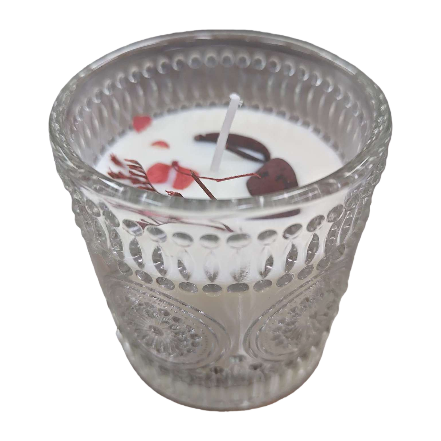 A transparent glass cup is filled with white candles and dark red petal decorations Item Picture
