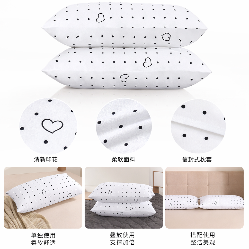 A white pillow with black dots and black heart-shaped patterns