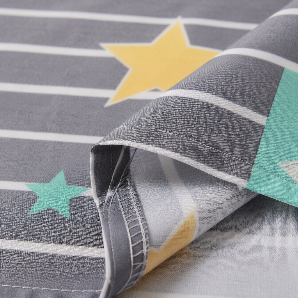 A four-piece set of pure cotton bed sheets and duvet covers with grey stripes and star prints Application Scenario