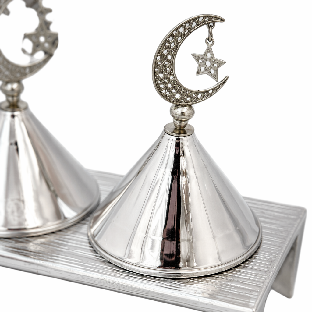 A silver metal double-conical incense burner ornament with a crescent star top decoration Application Scenario