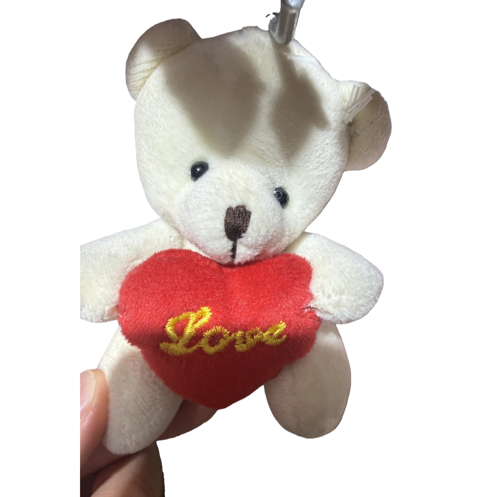 The white bear doll has a red heart-shaped ornament on its chest embroidered with the yellow words "2023" Item Picture