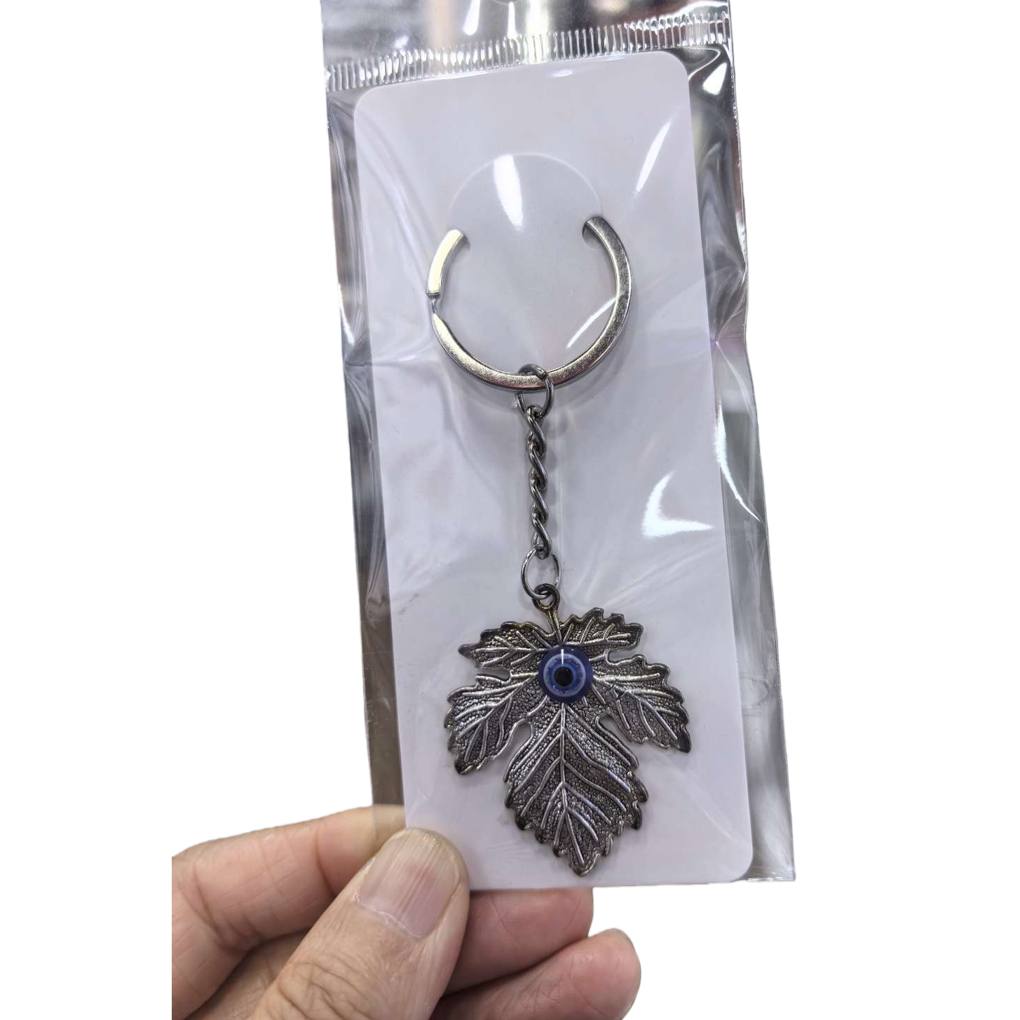 Forma de hoja de uva plata llavero corazón de hoja ojos azules adornos de cuentas anillos de metal torsión cuerda cadena tarjeta blanca bolsa transparente Item Picture