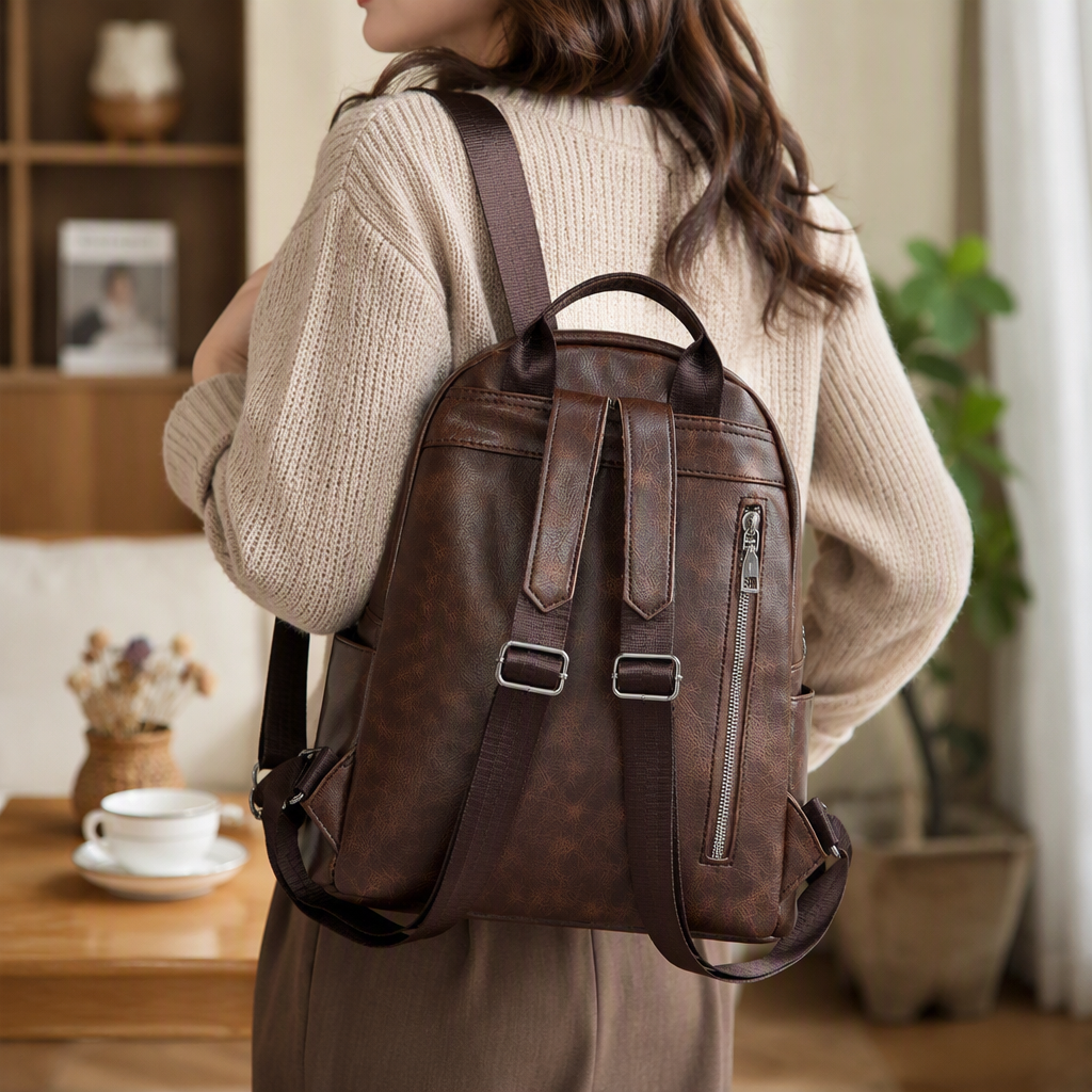 The brown leather backpack is simple, versatile, lightweight and has a large capacity for student commuting details Picture
