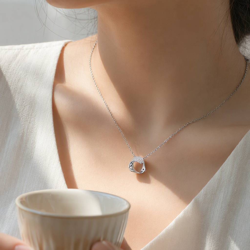 Silver circular diamond-encrusted pendant necklace details Picture
