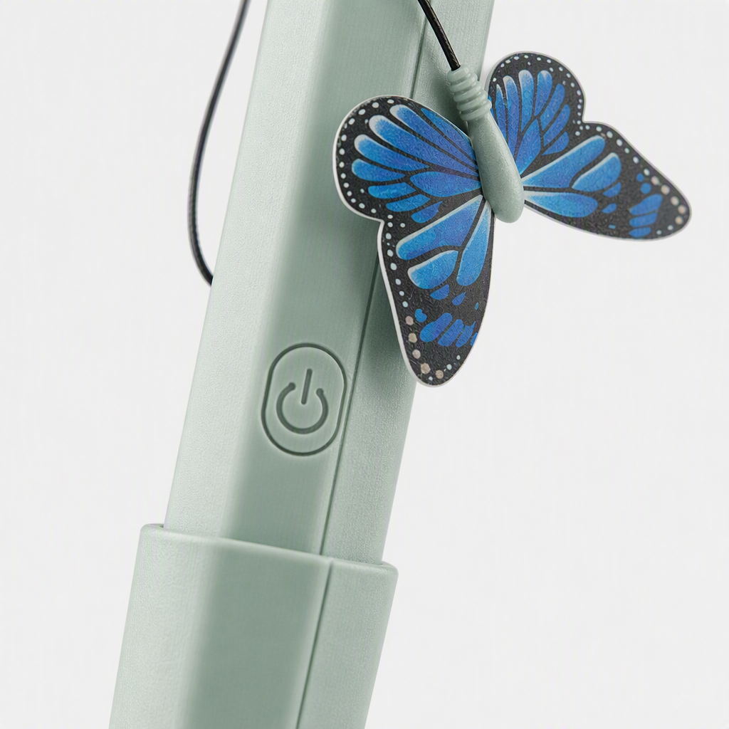 Light green, butterfly-shaped cat teaser with suction cup, rechargeable smart pet toy Application Scenario