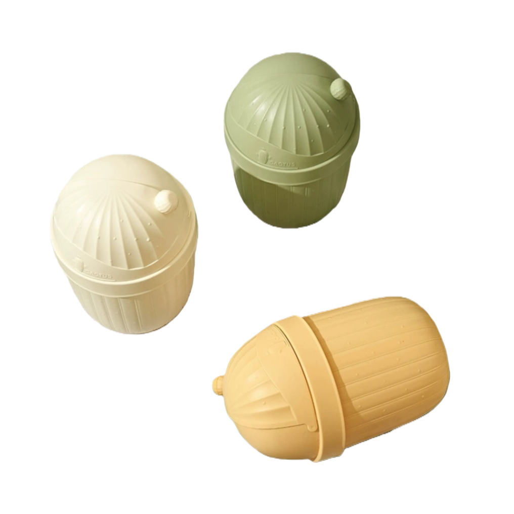 The creative three-color cactus flip lid trash can is green, off-white and light yellow. It is environmentally friendly and practical for home storage, placed on a checkered tablecloth Item Picture