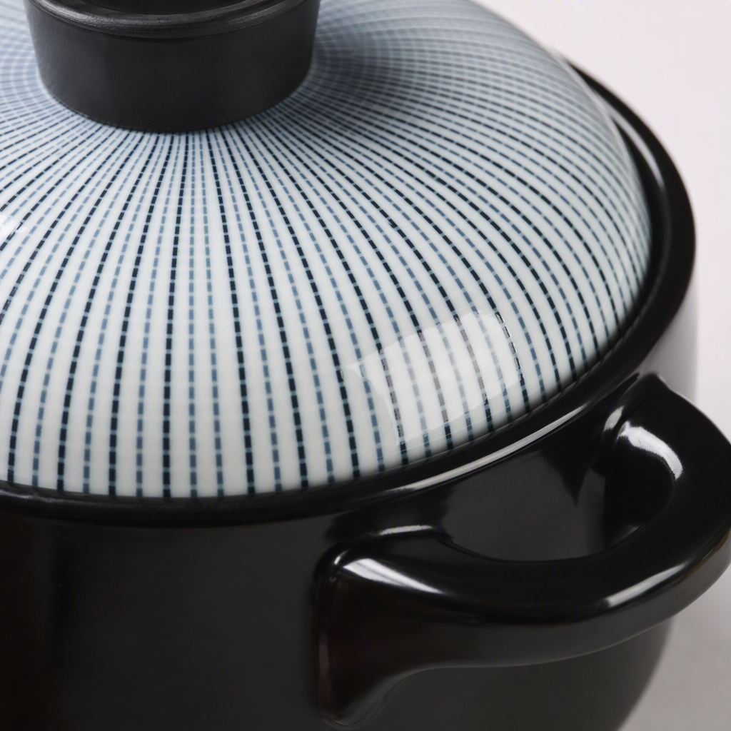 Black ceramic cookware with blue and white striped LIDS, heat-resistant and durable, suitable for home kitchen stewing, soup pot and stir-frying Application Scenario
