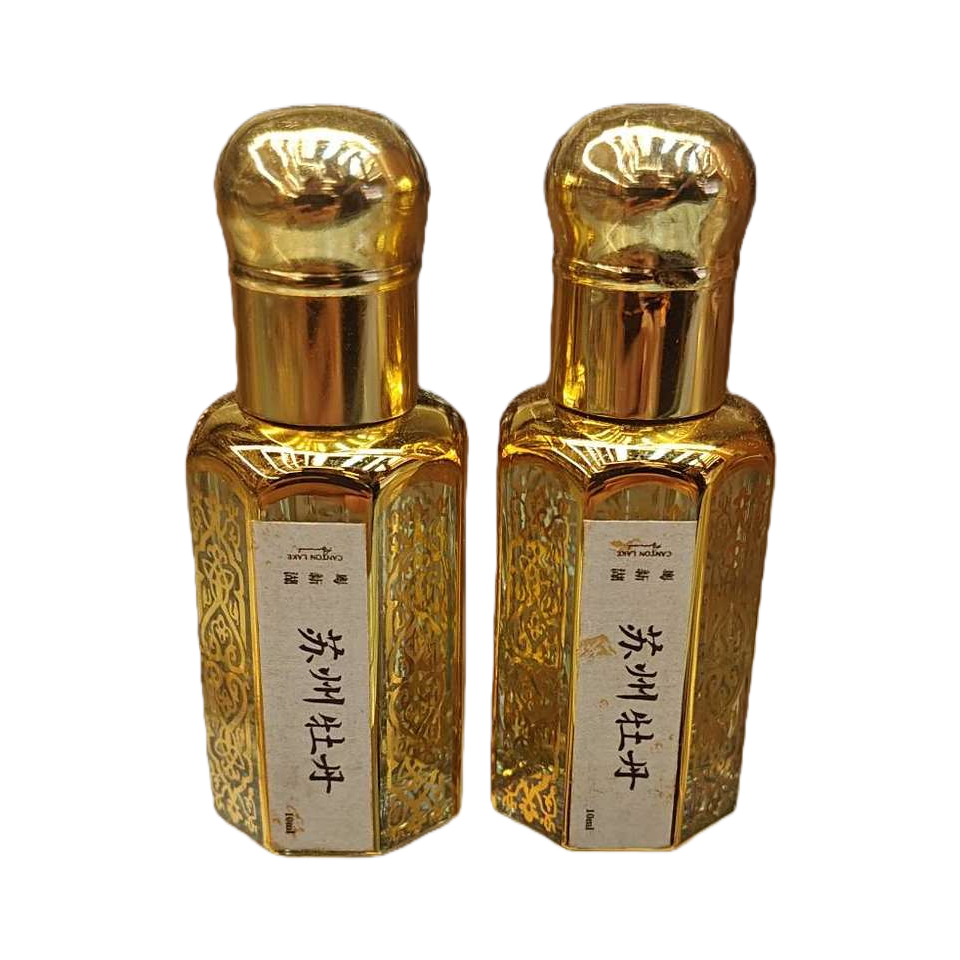 قنينة صغيرة من الازهار الذهبية مزخرفة بالذهب Item Picture