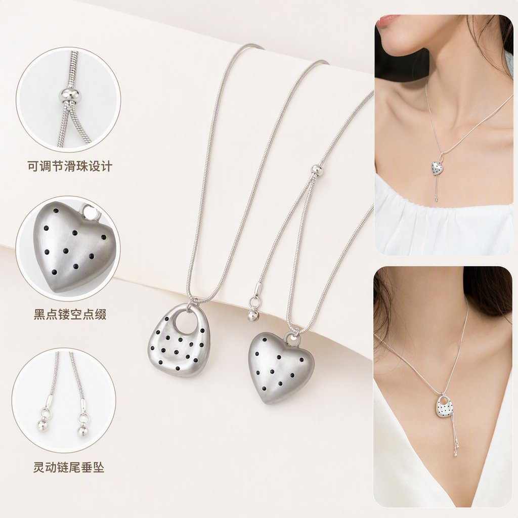 The silver snake bone chain necklace and heart-shaped water drop pendant are fashionable and versatile women's accessories. They are elegant, simple and trendy as gifts