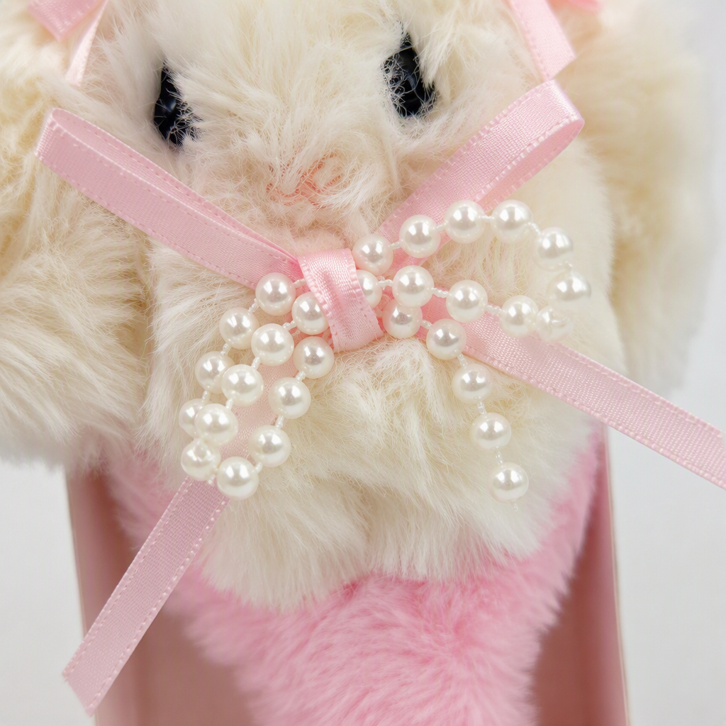 Pink plush rabbit-shaped comb with bow pearl decoration, cute hair comb, suitable for both children and adults Application Scenario