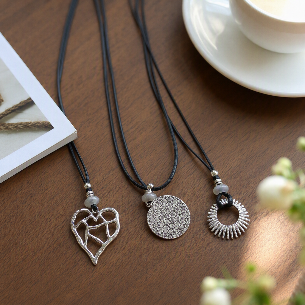 Silver heart-shaped hollowed-out pendant, honeycomb pattern circular radial ring necklace with black rope chain, fashionable and versatile accessory details Picture
