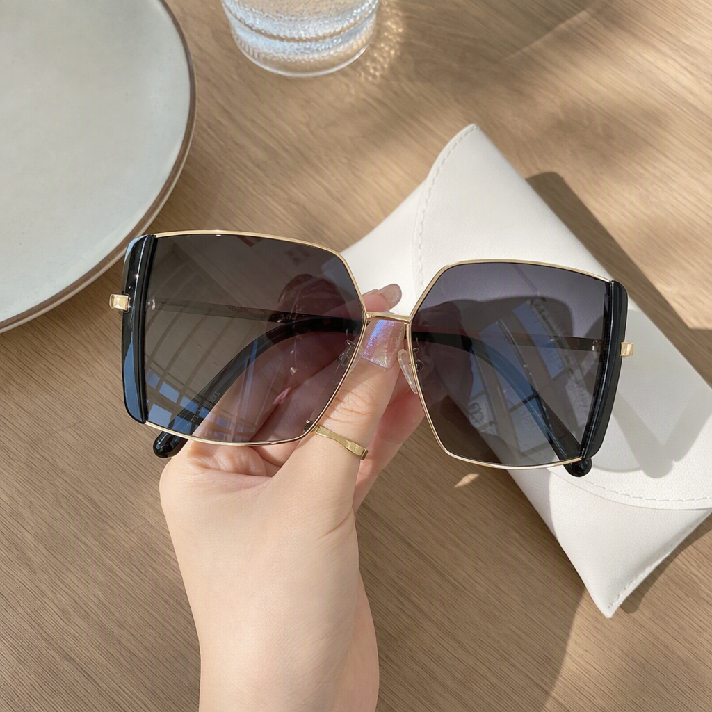 Fashionable gold-framed black lens sunglasses with a white portable case, trendy and casual sunglasses for both men and women details Picture
