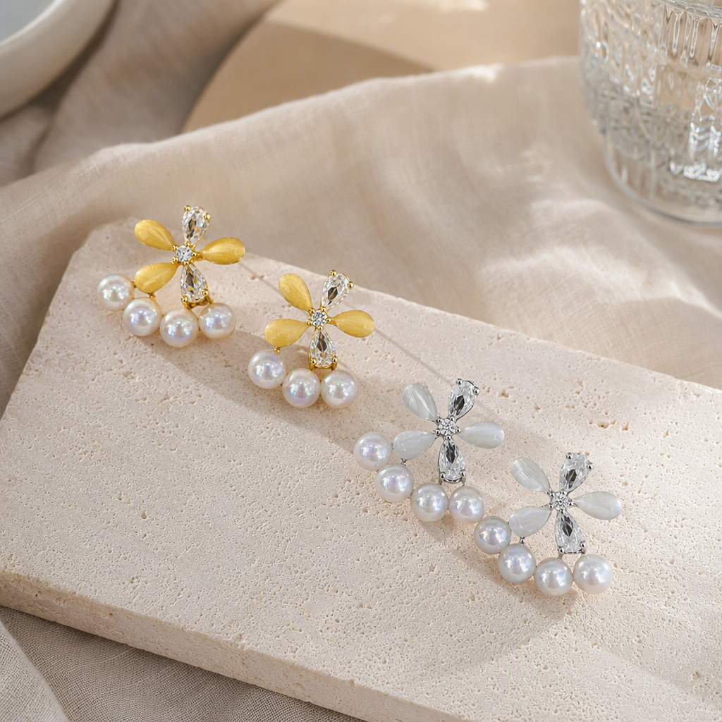 The black tray showcases pearl flower earrings, fashionable and elegant accessories, jewelry, ornaments and collectibles details Picture