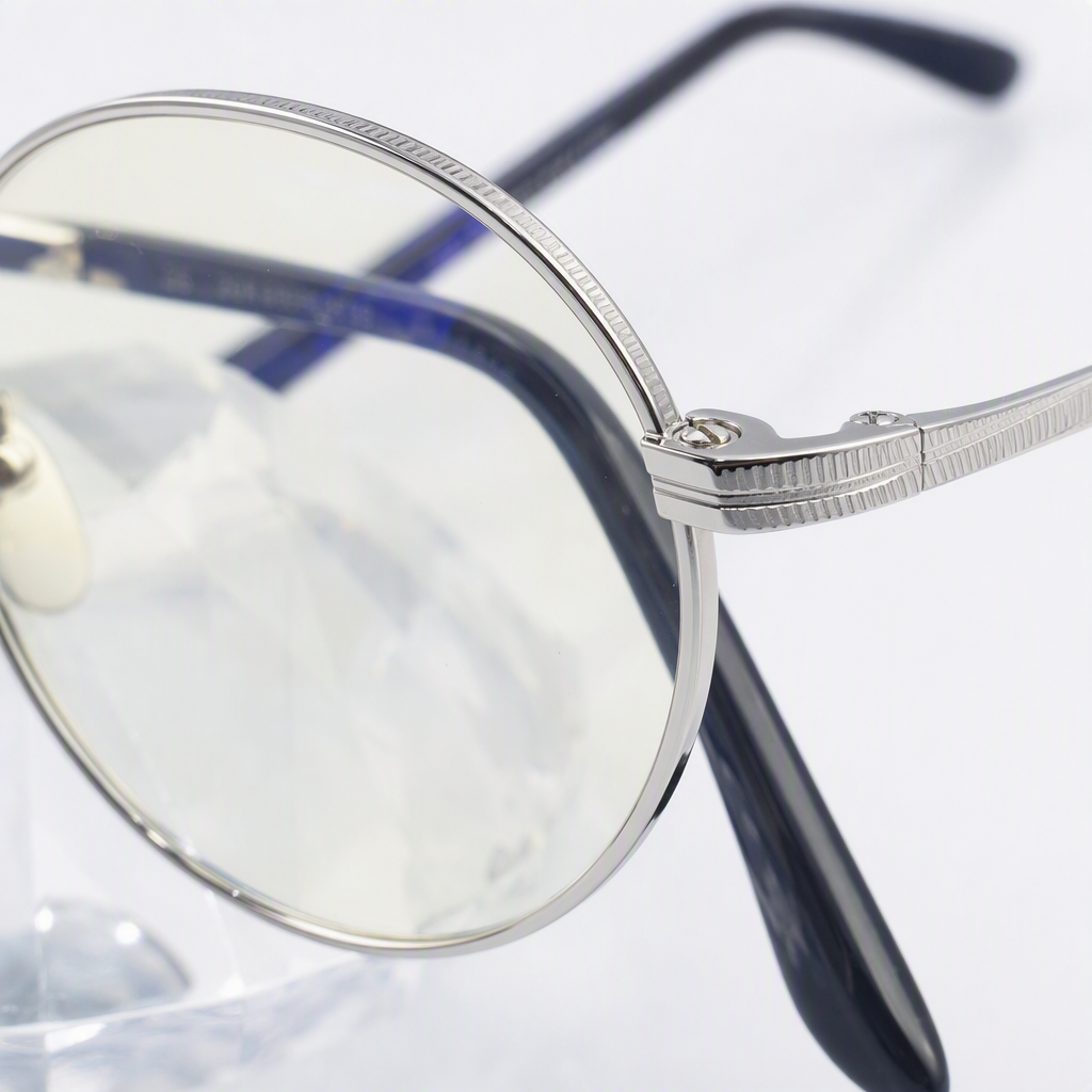 Fashionable silver round-framed glasses, dark blue temple display stand, transparent crystal base ornament collectible Application Scenario