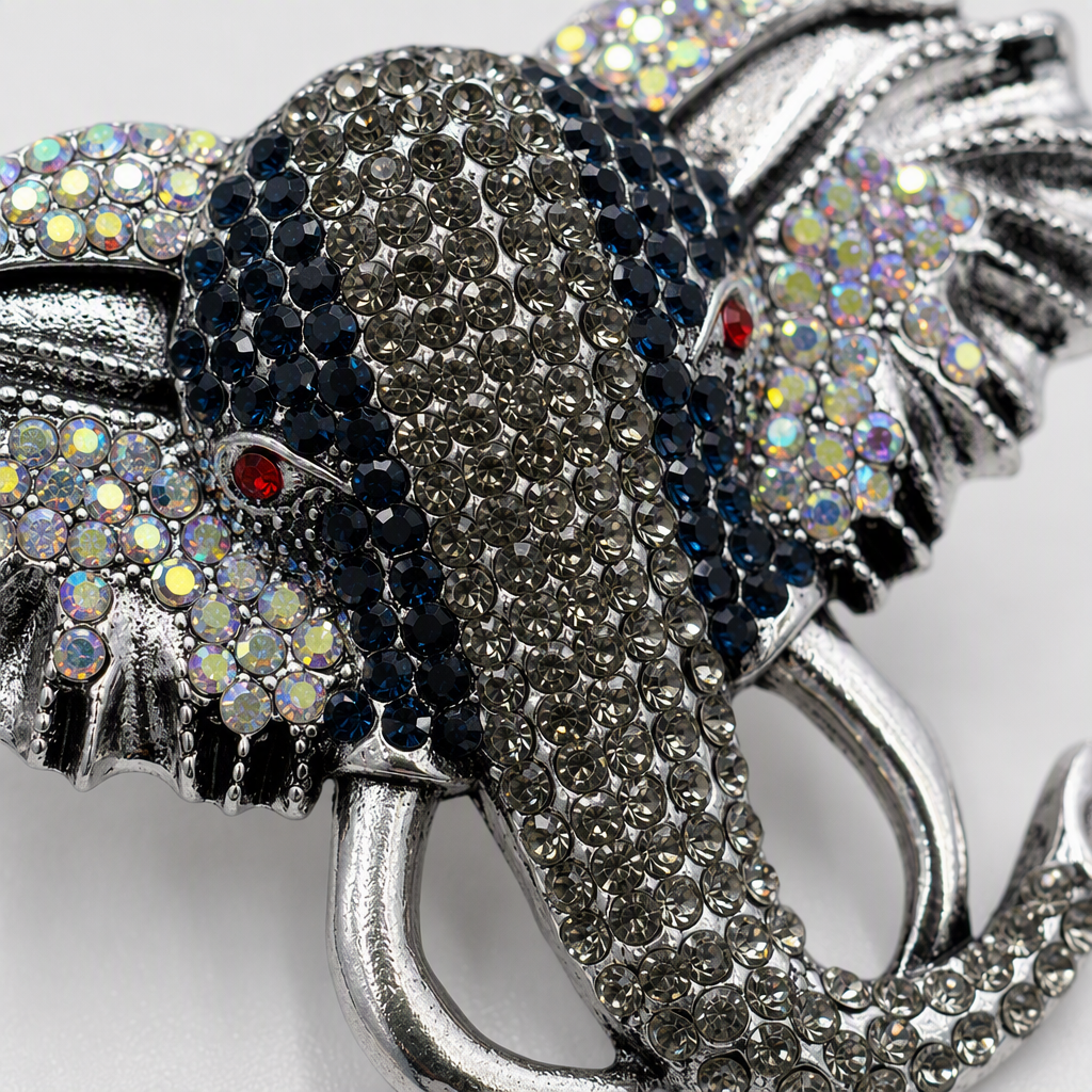 A silver diamond-encrusted elephant-shaped brooch is a fashionable, versatile and unique ladies' accessory and gift collection Application Scenario