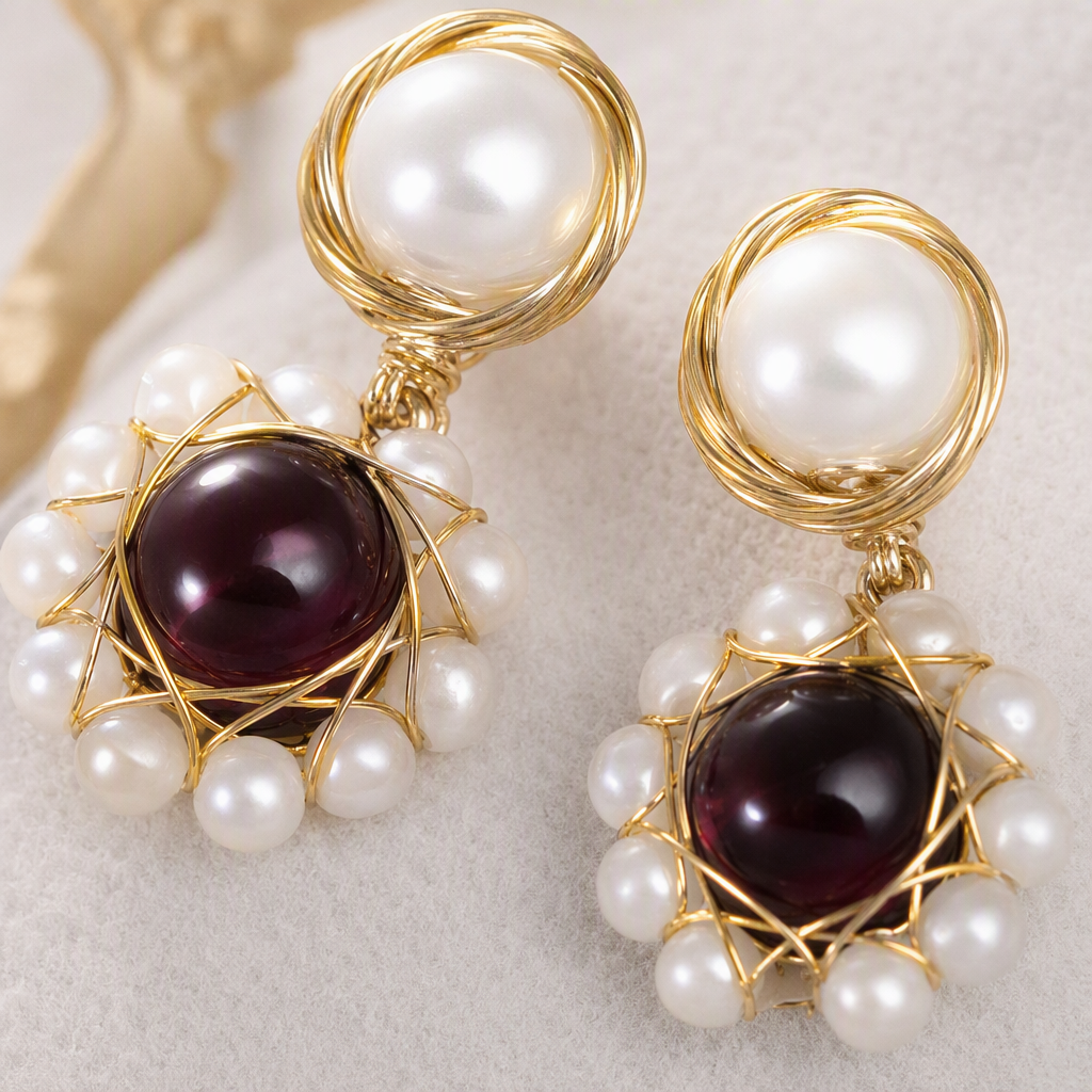 White jewelry box with golden pearl and ruby earrings. Fashionable and elegant accessories. Women's gift box packaging Application Scenario