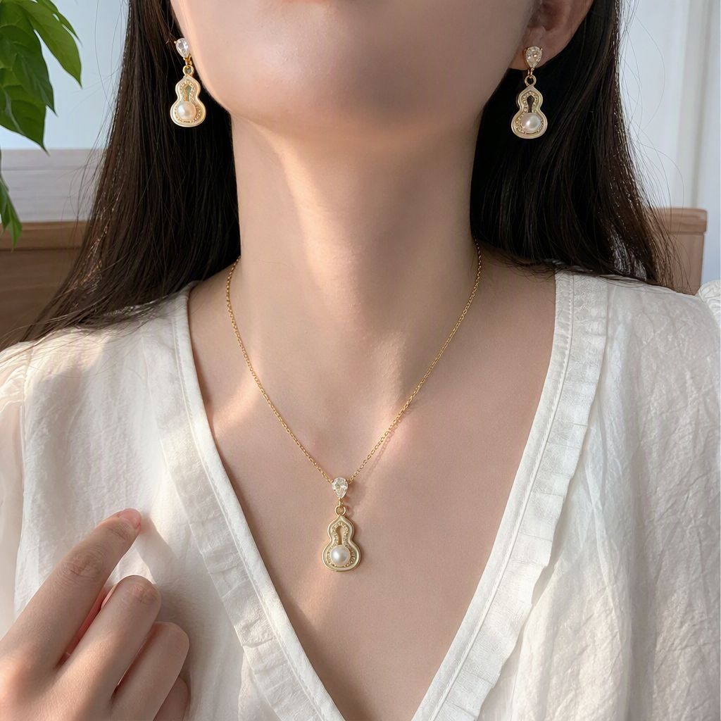 DANTAO peach jewelry, golden gourd-shaped necklace, earrings and hairpin set, elegant accessories set with pearl and crystal details Picture