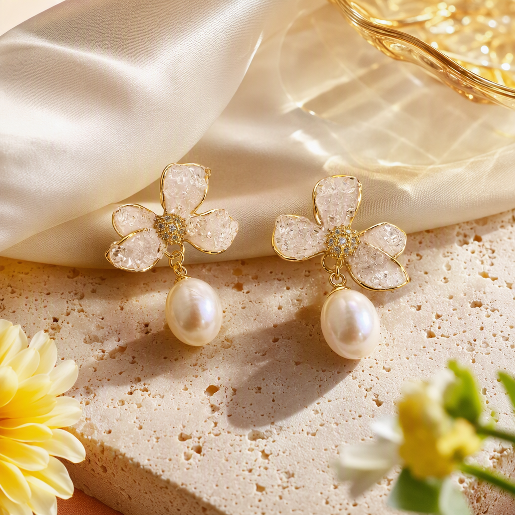 The flower-designed pearl earrings in the white jewelry box are elegant, fashionable and versatile accessories Specification image