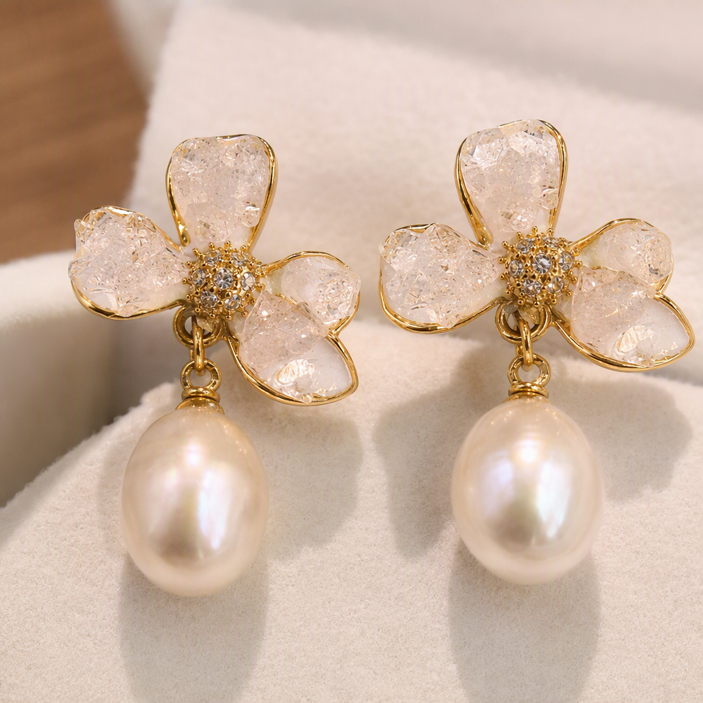The flower-designed pearl earrings in the white jewelry box are elegant, fashionable and versatile accessories Application Scenario