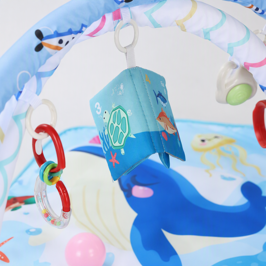 Blue ocean-themed baby play MATS with arched hanging toys and colorful small balls, safe and soft baby climbing MATS, children's early education toys Application Scenario