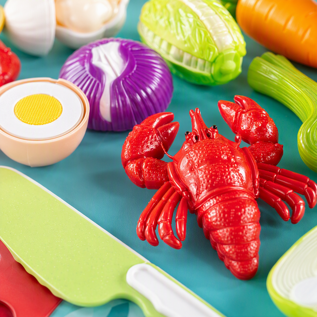 Colorful vegetable peeling and Slicing fun toy set, simulation fruit and vegetable model, children's kitchen game with knives displayed on a light blue background Application Scenario