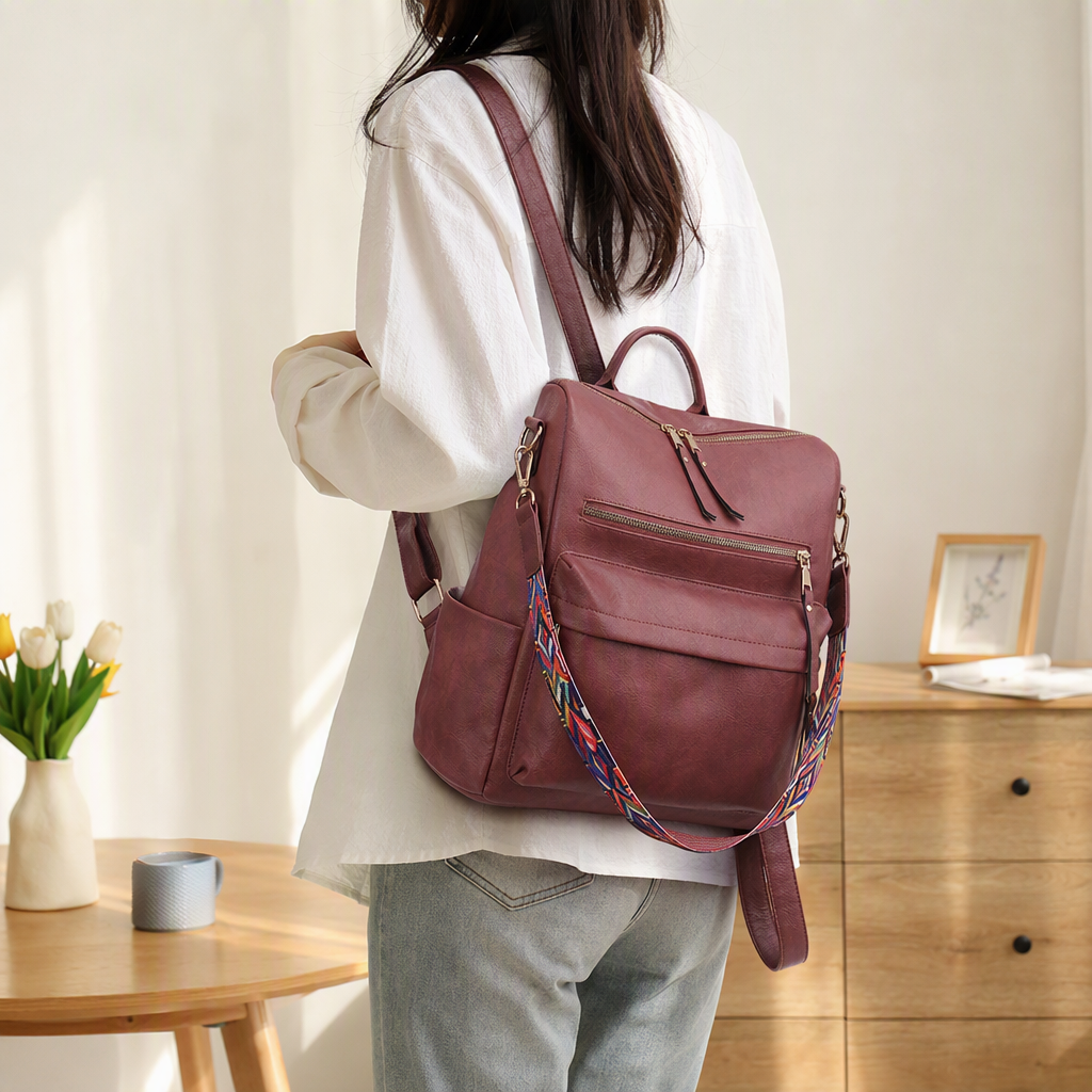 Fashionable wine red leather backpack with colorful geometric pattern shoulder straps, casual backpack for women, a trendy and versatile choice details Picture