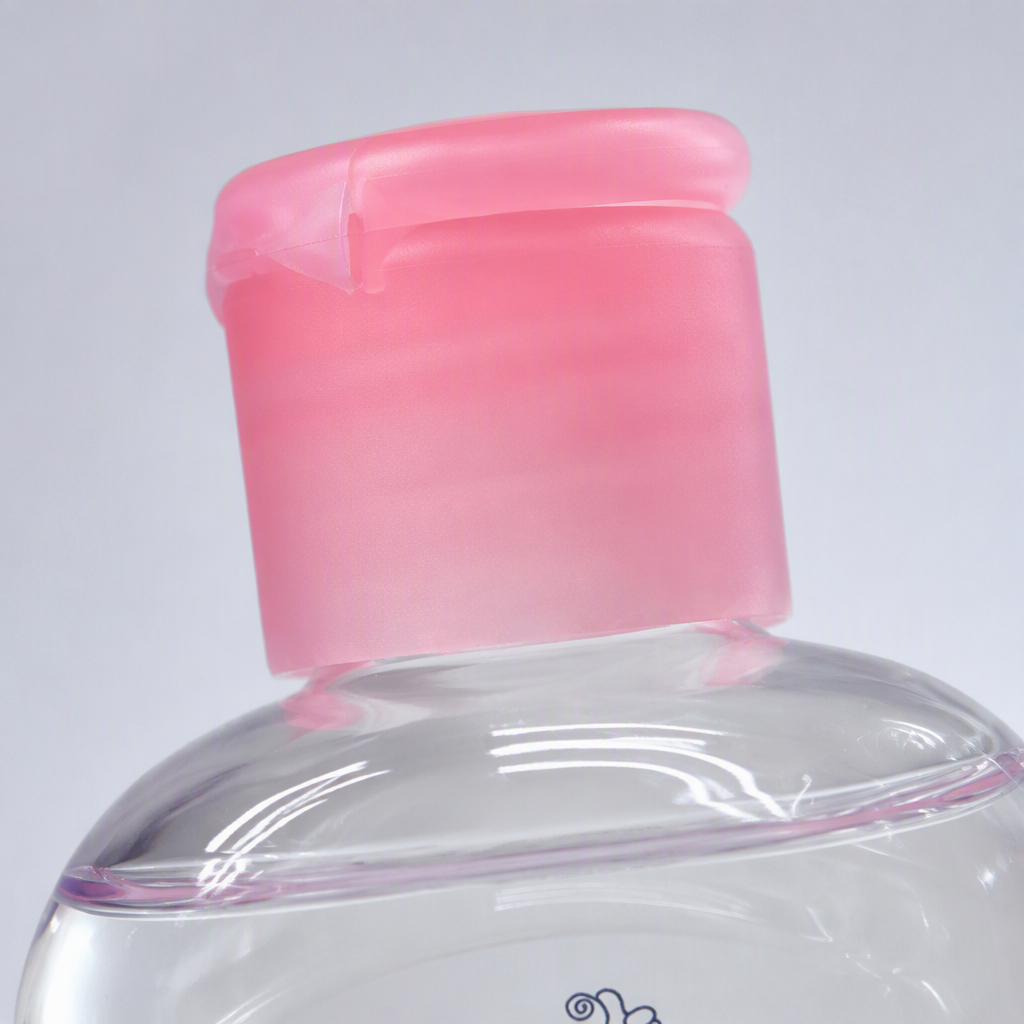 Baby moisturizing oil with pink cap and transparent body gently nourishes your baby's skin, specially designed for infants and toddlers Application Scenario
