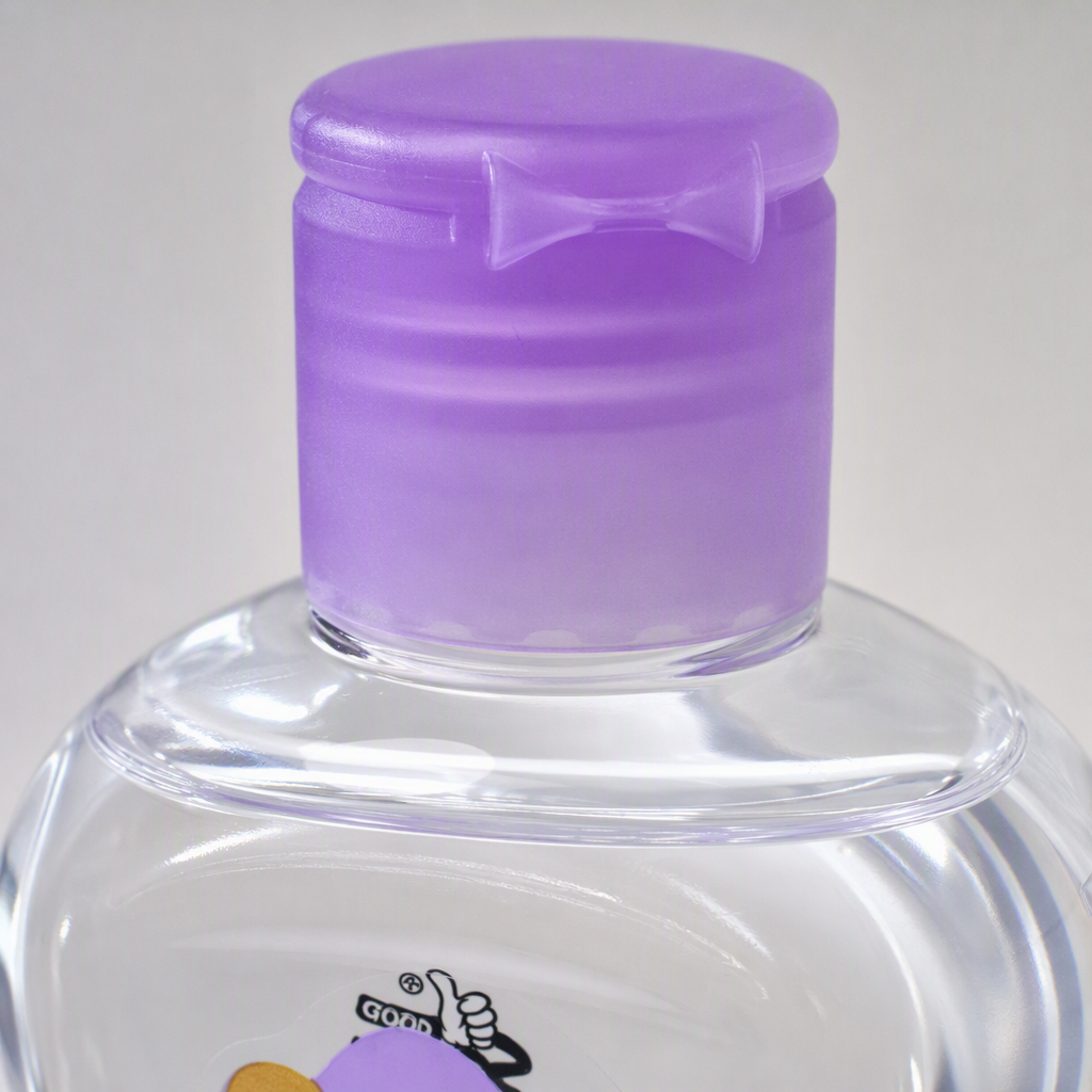 Baby moisturizing oil with purple cap and transparent bottle body, a gentle nourishing body care product for infants and young children Application Scenario
