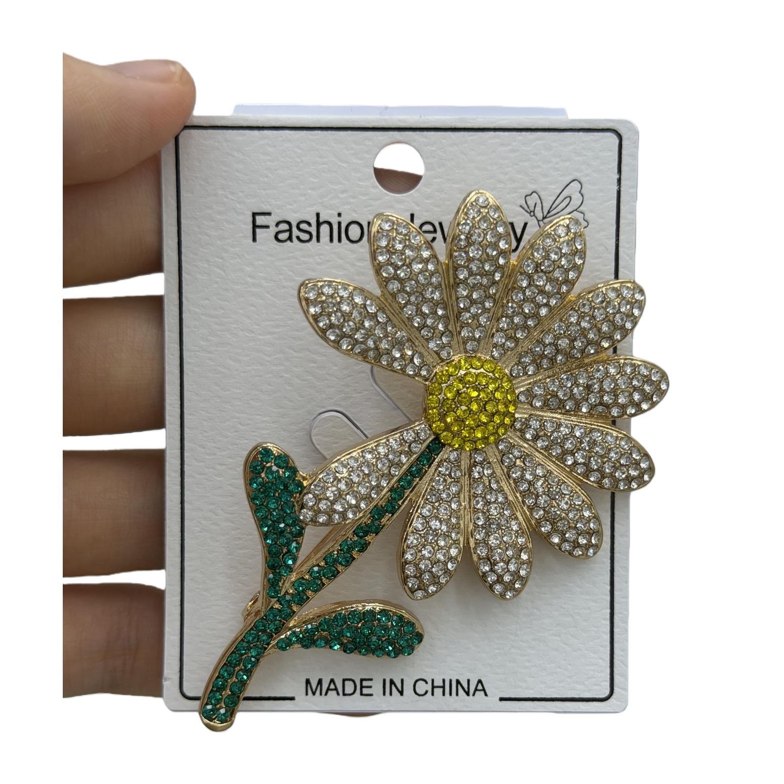 金色镶钻雏菊胸针白底实物图