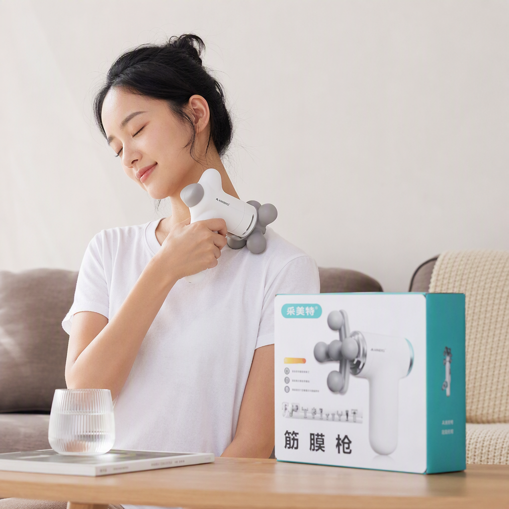 A multi-functional portable white massage gun for deep muscle relaxation and fatigue relief, a home physiotherapy device details Picture