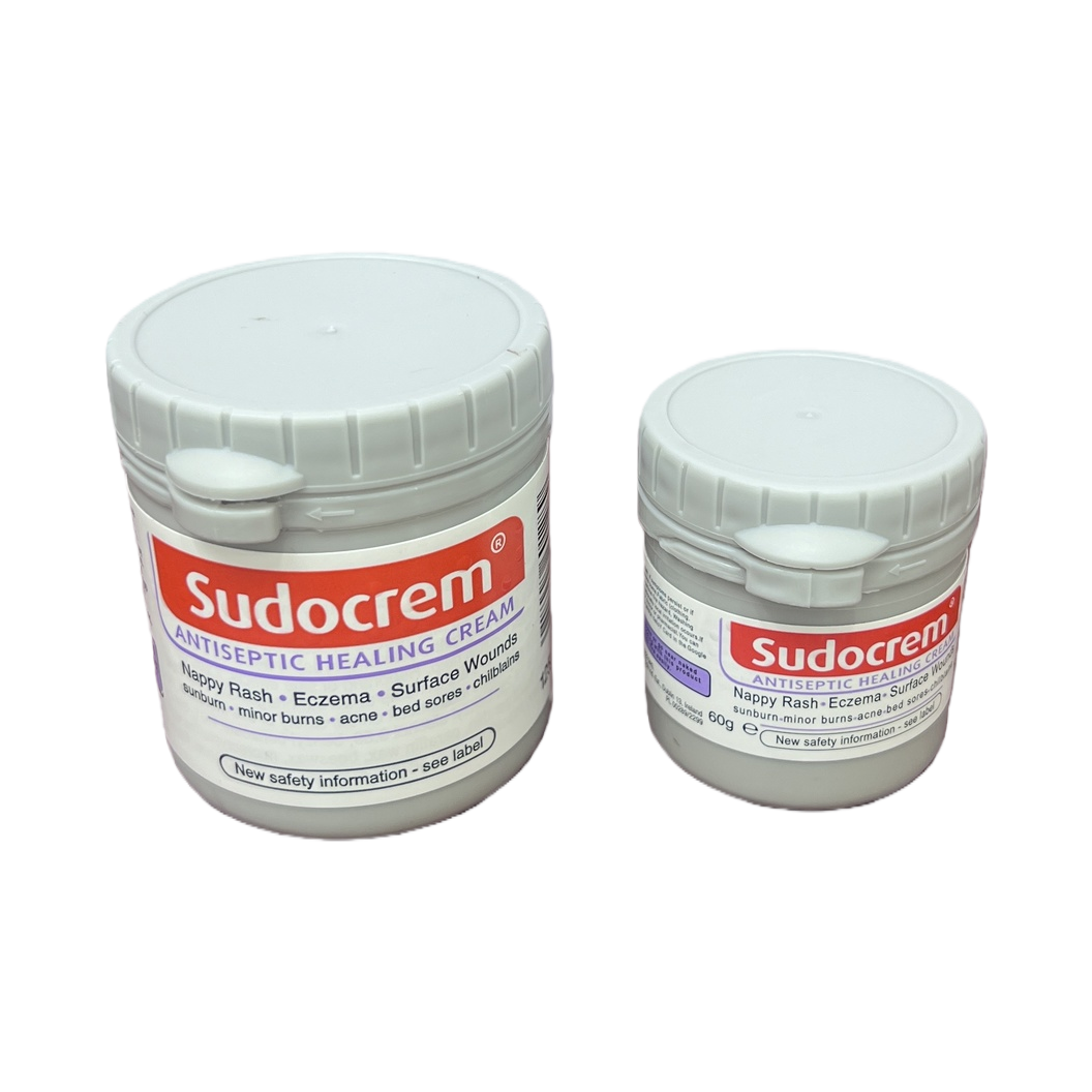 White canned buttock protection cream 60g large and small size sets for baby care, moisturizing and repairing, placed on a wooden table Item Picture