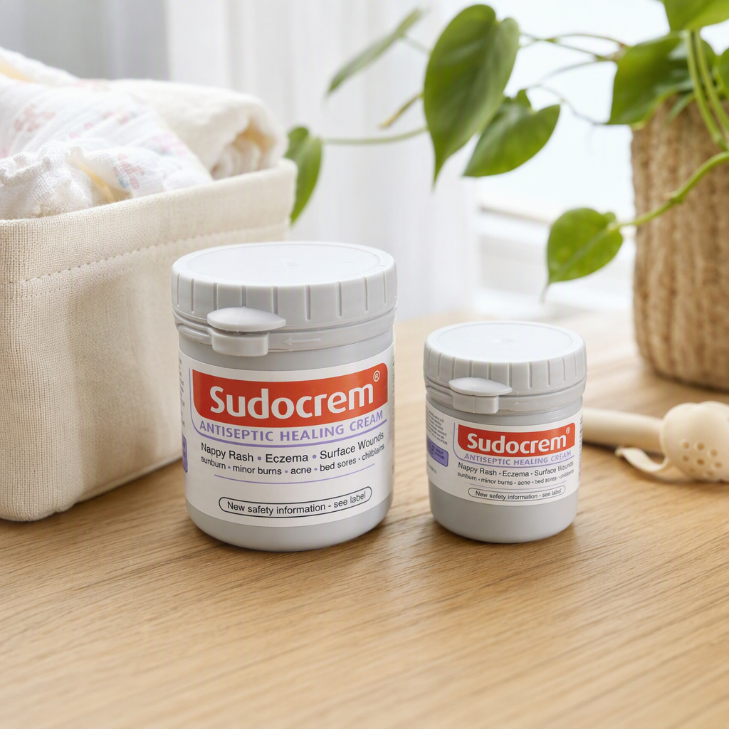 白色罐装 Sudocrem 护臀膏，含大中小两款规格产品图