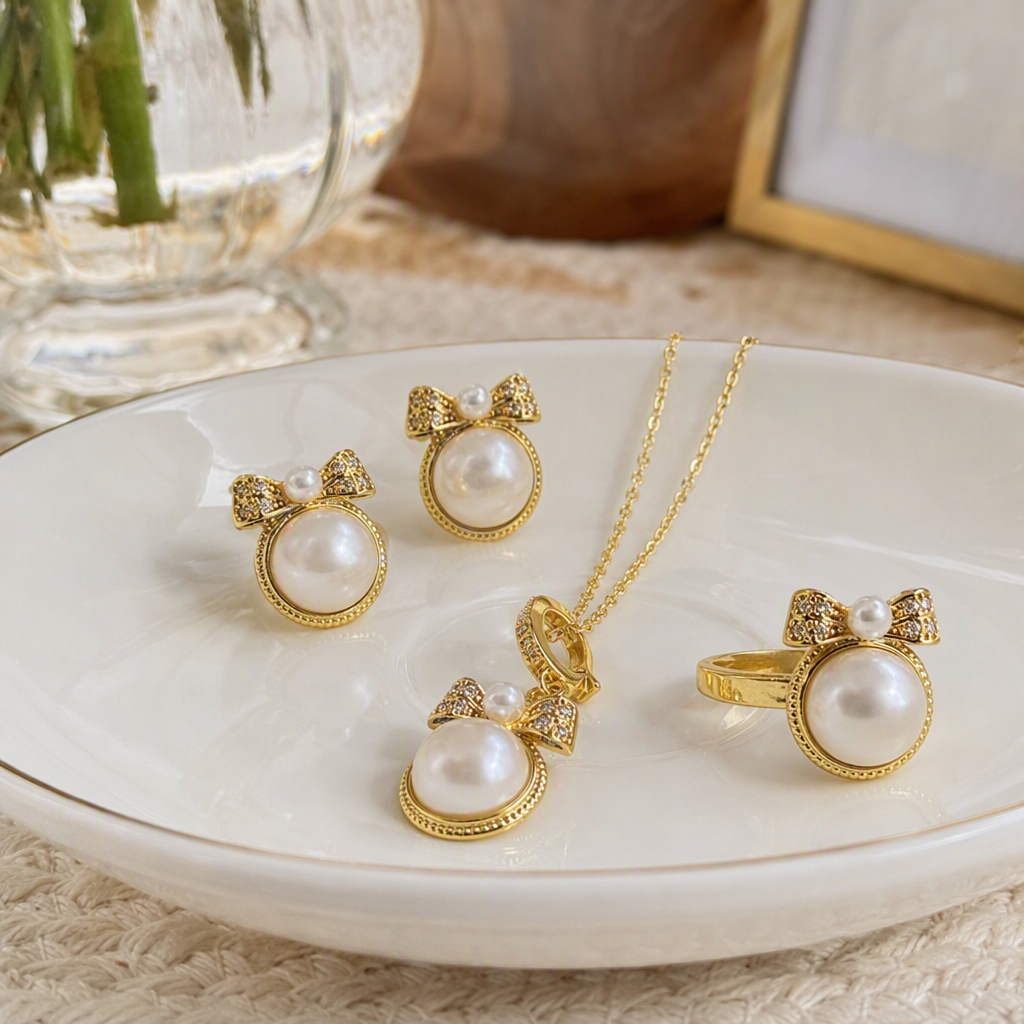 The golden pearl bow jewelry set is a fashionable and elegant accessory gift for your girlfriend's birthday details Picture