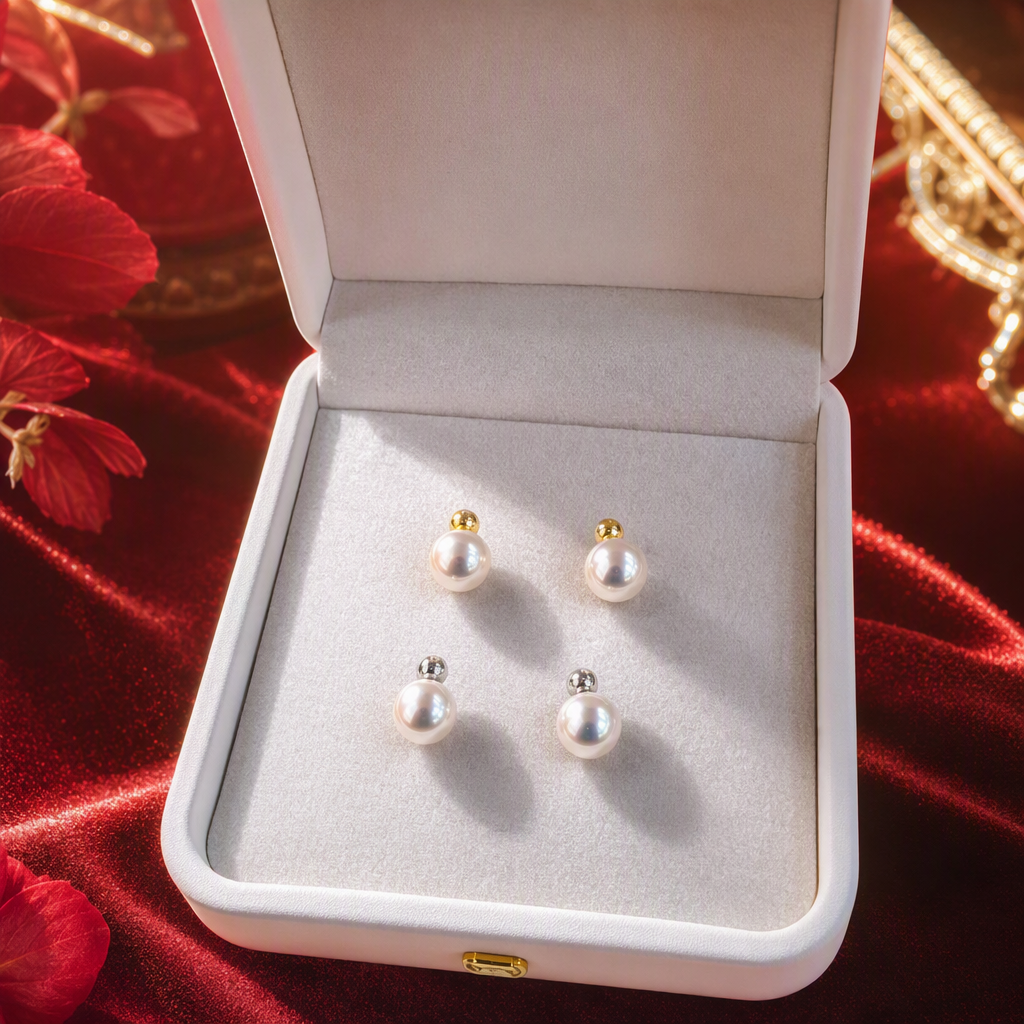 The white jewelry box features four pearl stud earrings, a gold and silver base, and an upper and lower row design. It is simple and fashionable for storing accessories and gifts Specification image