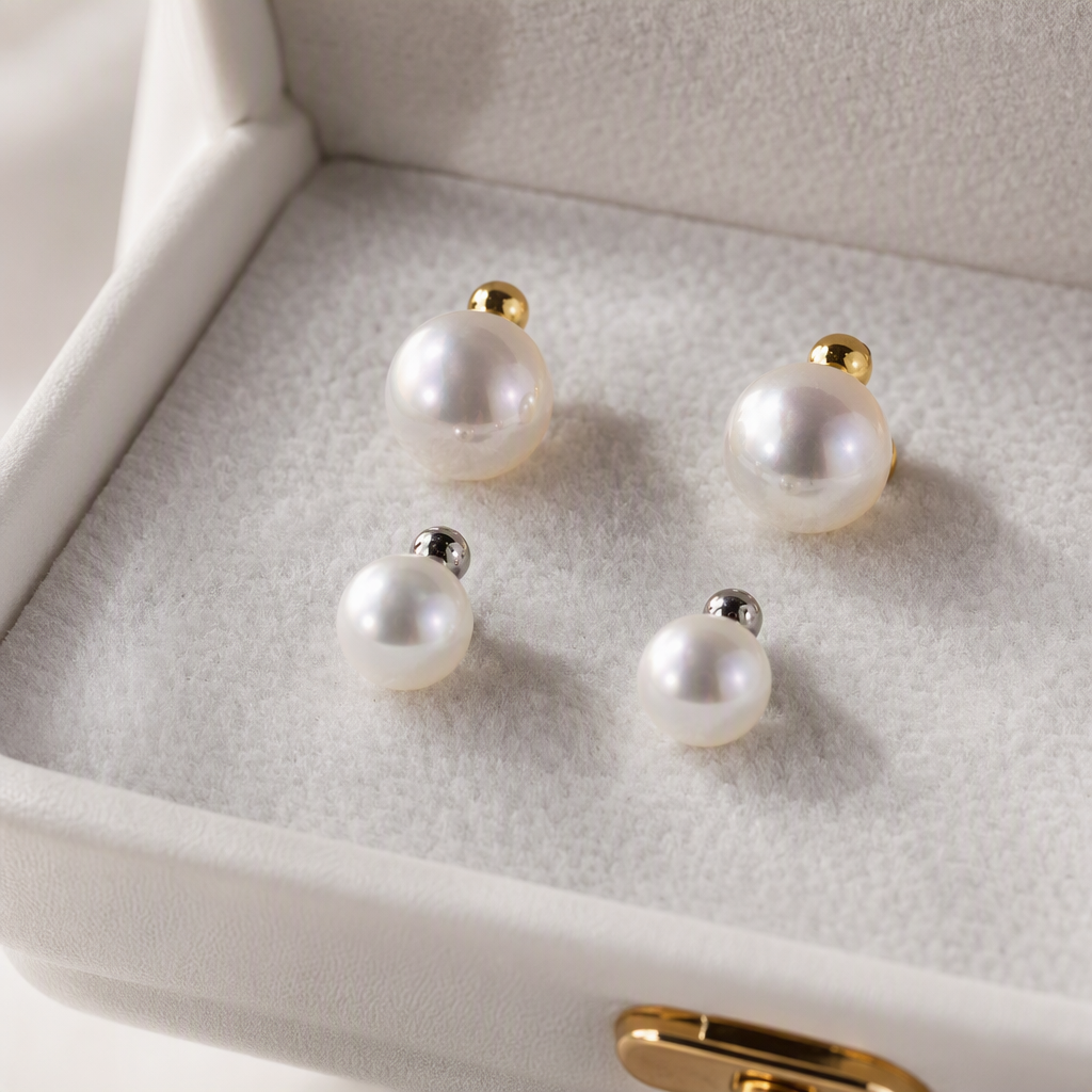 The white jewelry box features four pearl stud earrings, a gold and silver base, and an upper and lower row design. It is simple and fashionable for storing accessories and gifts Application Scenario