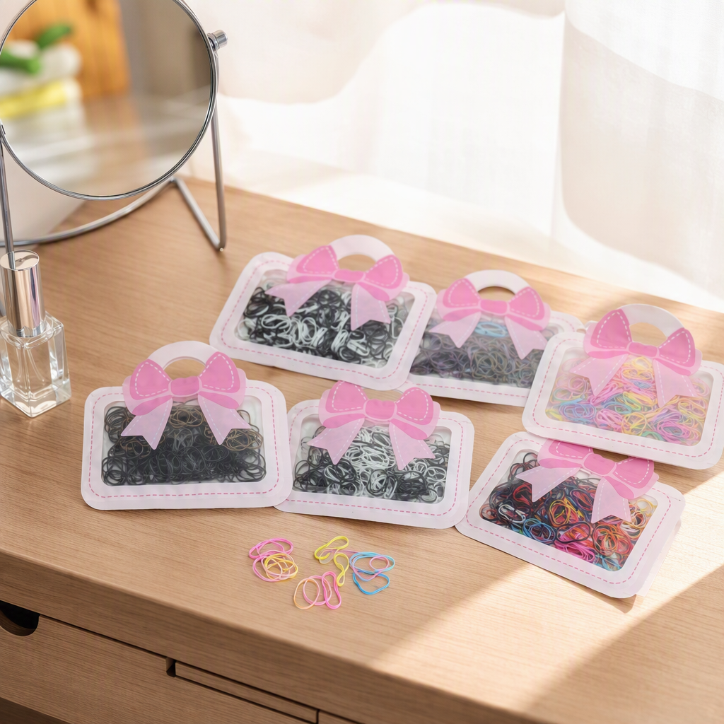 Colorful rubber bands, pink bow packaging, creative stationery, elastic rubber bands, hair ties, hair accessories, decorative items details Picture