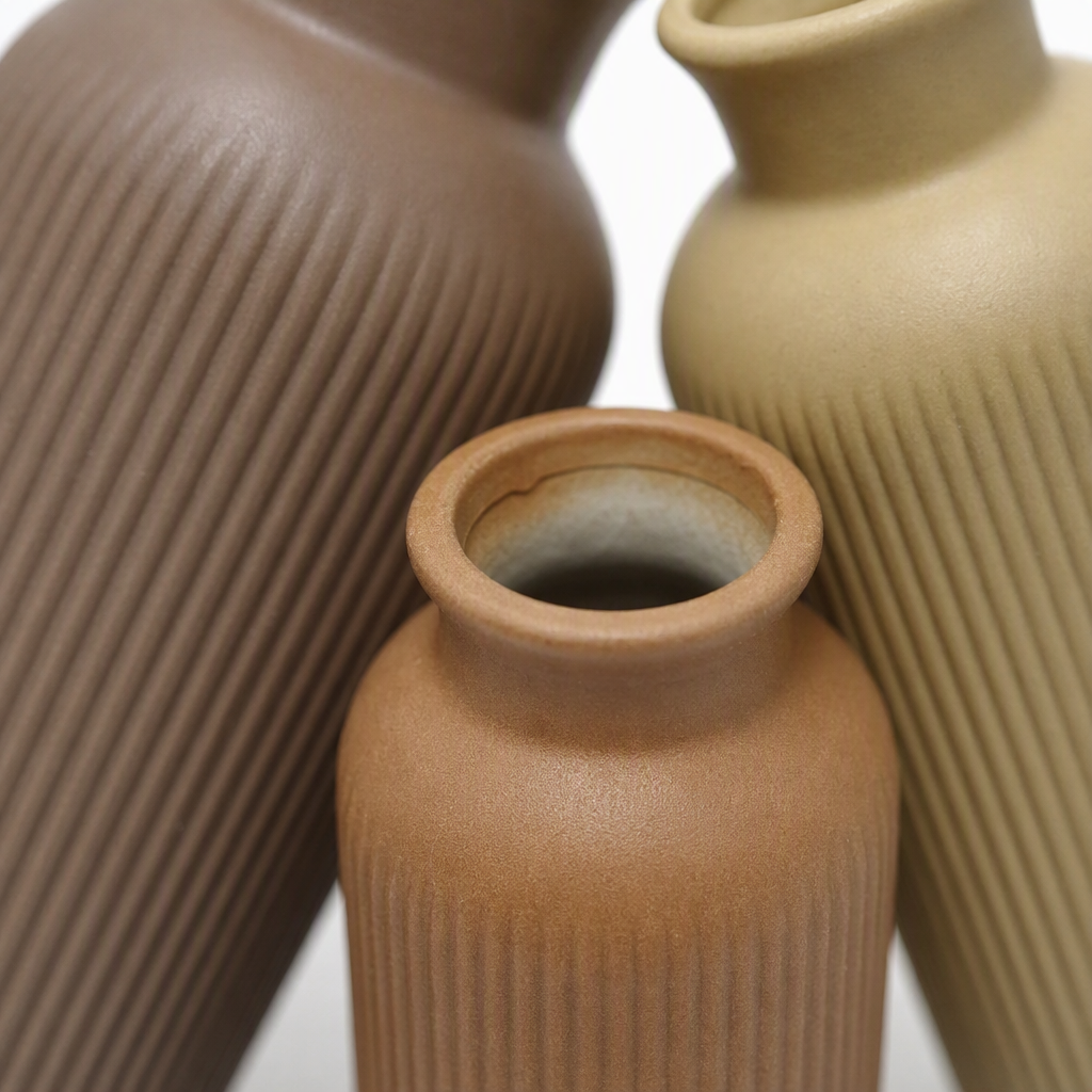 Brown vertical patterned earthenware vase, beige vertical patterned earthenware vase, orange vertical patterned earthenware vase, creative decorative ceramic vase handicrafts Application Scenario