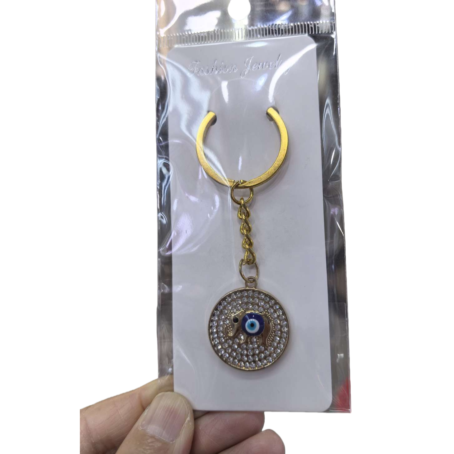 金色钥匙扣圆形镶钻吊坠大象邪眼图案时尚创意礼品配饰白底实物图