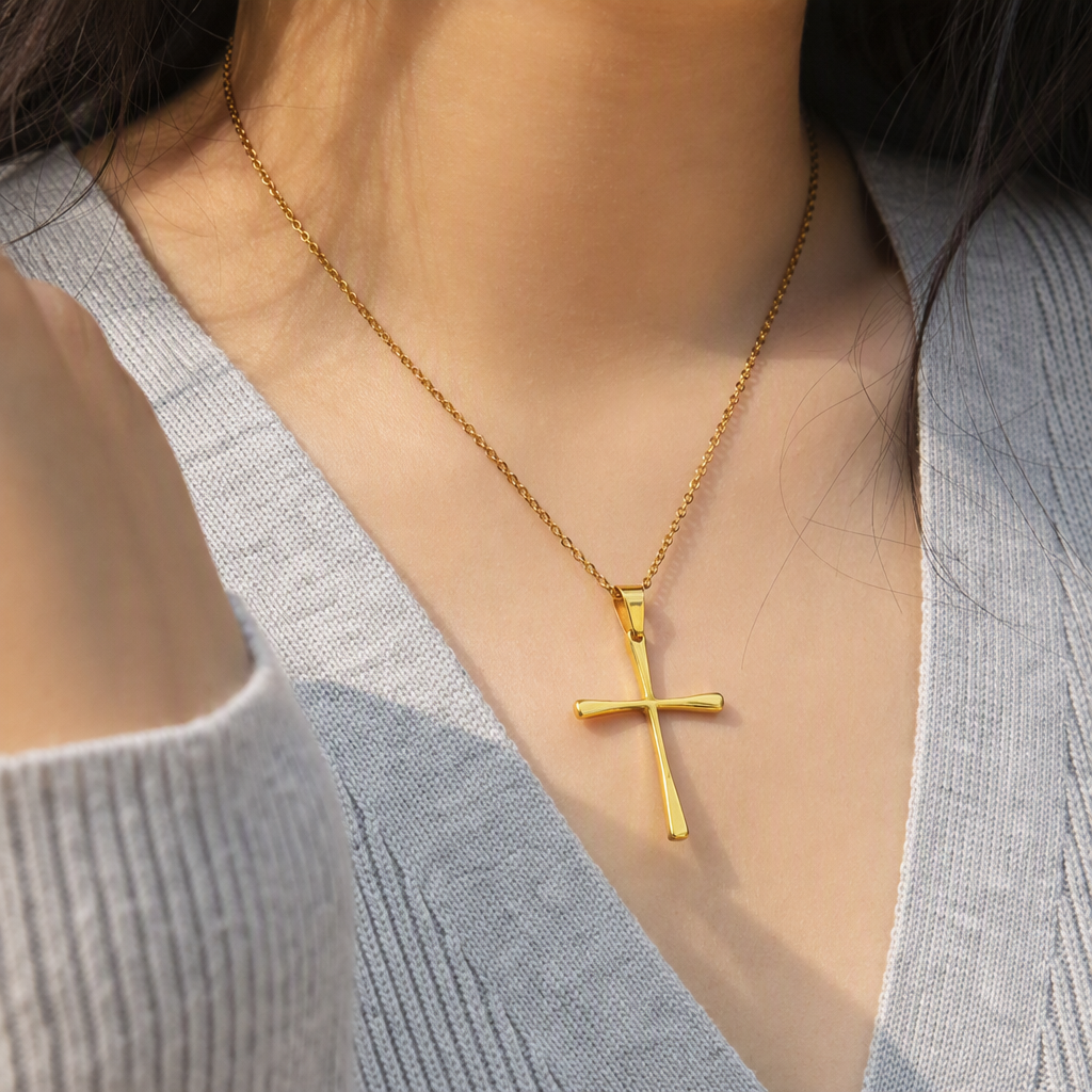 A simple polished stainless steel necklace pendant with a golden steel cross and letter accessories, a fashionable and versatile accessory for both men and women details Picture