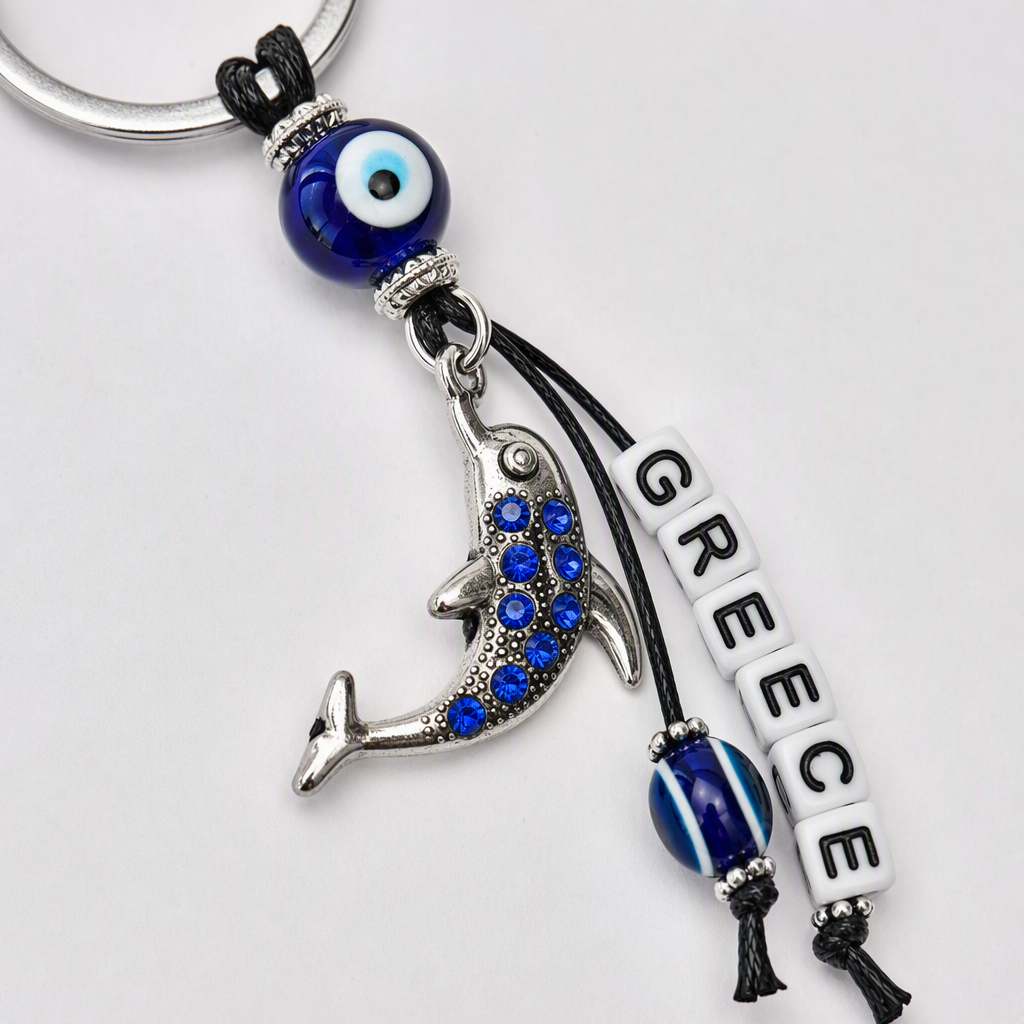 Silver keychain with blue Devil's eye dolphin pendant, white letter beads, blue and white stripes, Devil's Eye packaging card plate accessory Application Scenario
