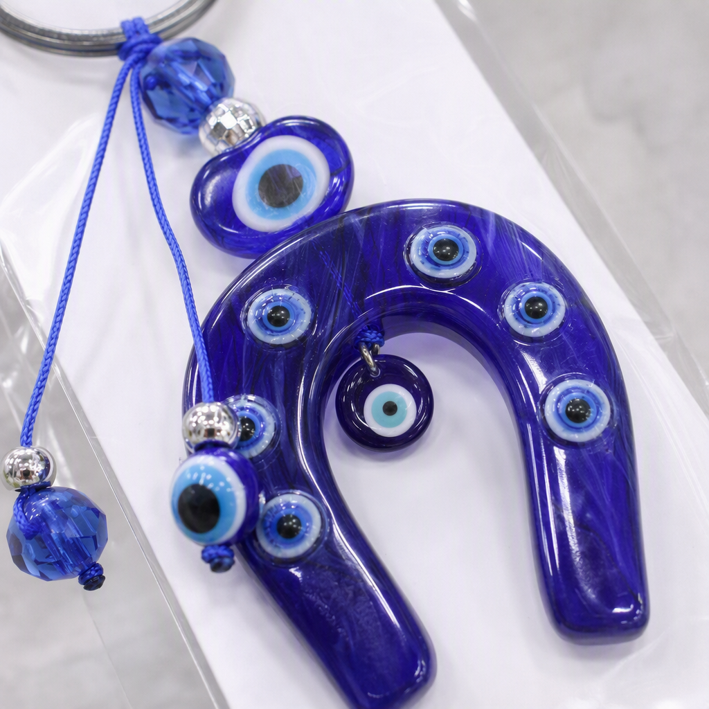 Cool blue Devil's Eye keychain pendant, personalized and creative car key chain accessory, gift and giveaway Application Scenario