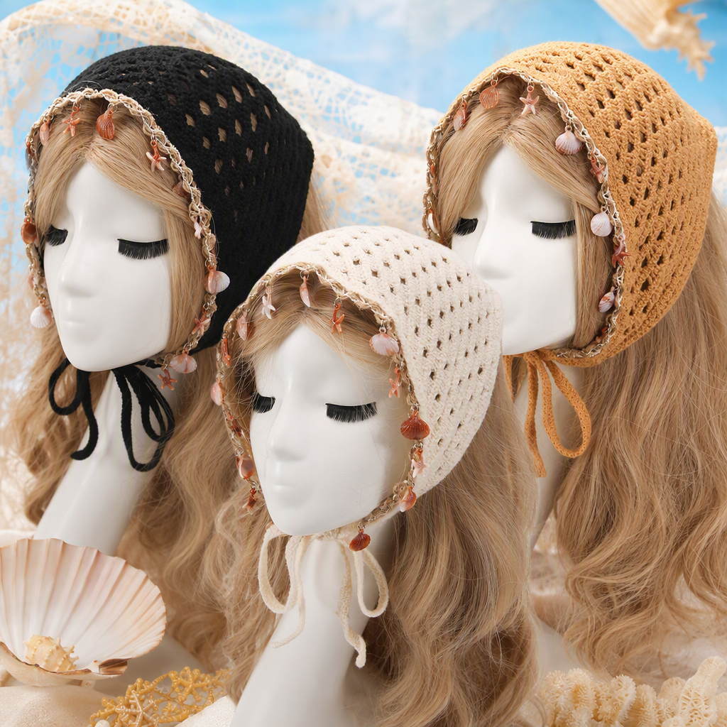 A creative handmade accessory display prop featuring a beige crocheted headscarf decorated with a shell and starfish pendant and a dummy head model Specification image