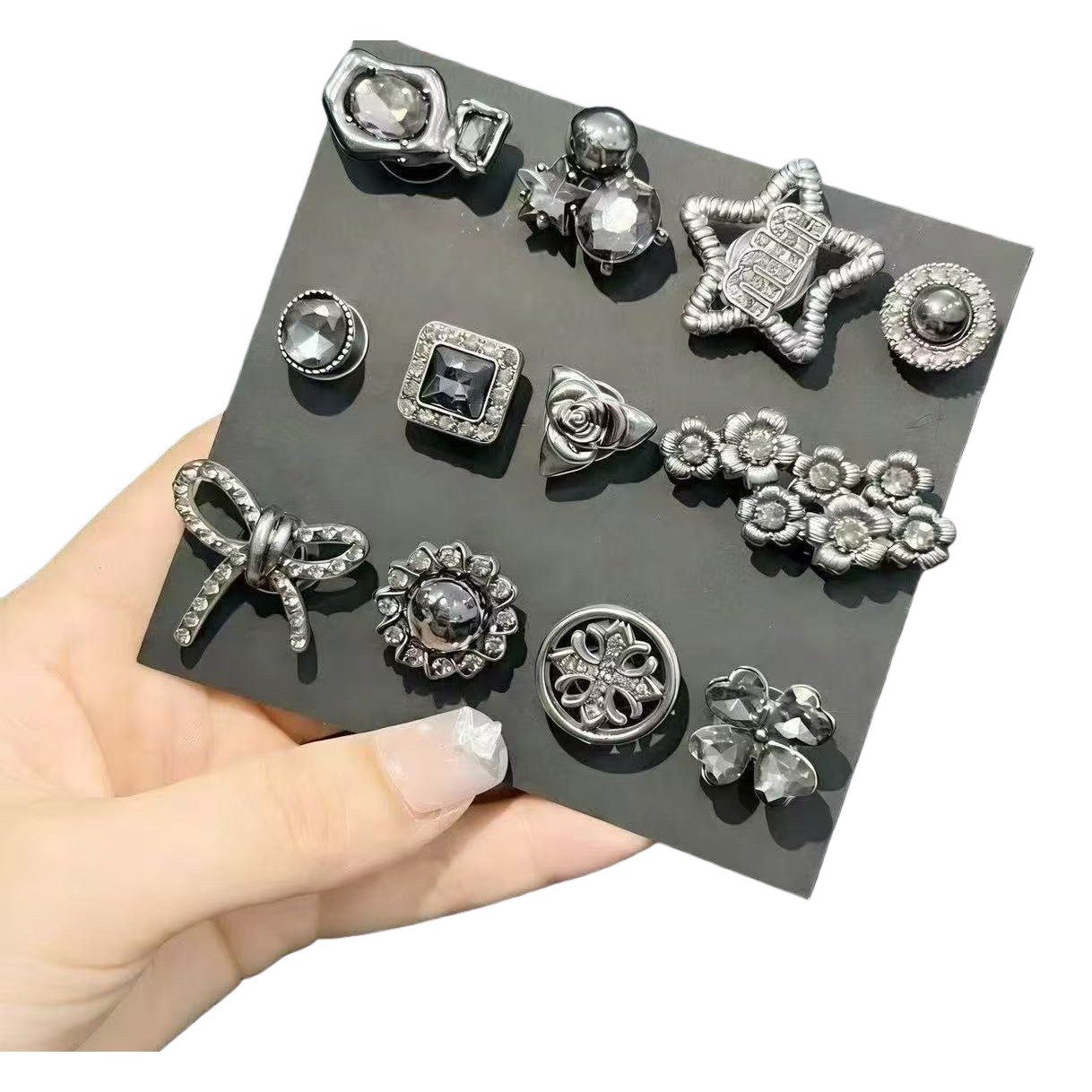 The shining silver diamond-encrusted stud earrings set is a simple and fashionable pair of earrings. It is a versatile and trendy accessory Item Picture