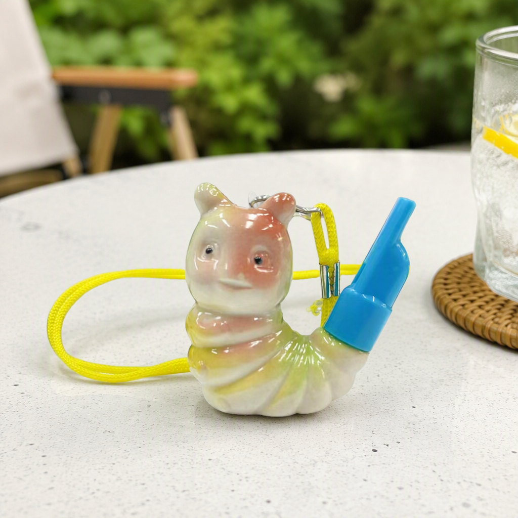 Silbato de agua de oruga de cerámica puede inyectar sonido de agua animal silbato stand para niños pequeños juguetes de cerámica divertidos
