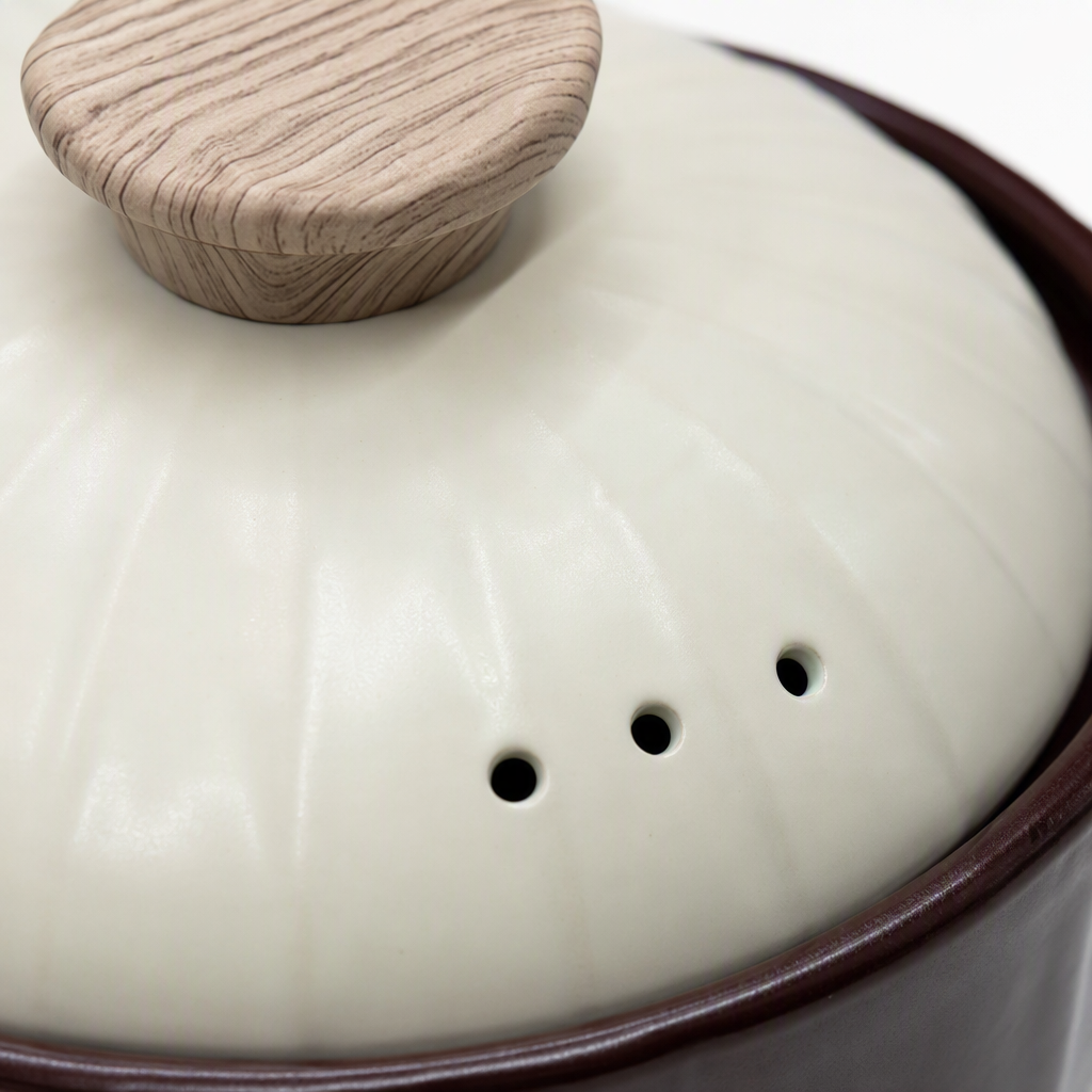 This dark brown ceramic pot with a beige textured lid is a household kitchen soup pot that is heat-resistant and durable Application Scenario