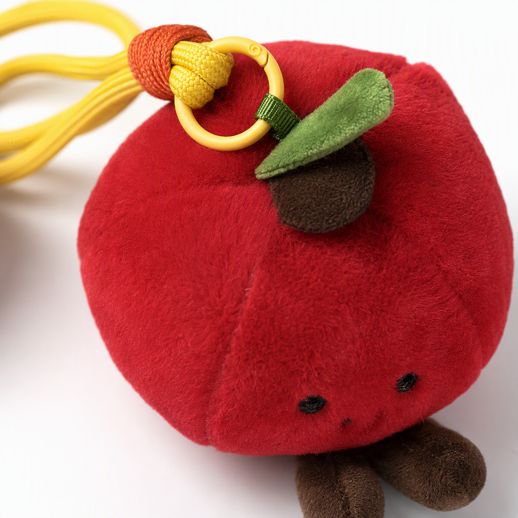 Four cute fruit-shaped plush pendants: red strawberry pitaya and yellow pineapple. Fun handcrafted fabric pendants for gift bags Application Scenario