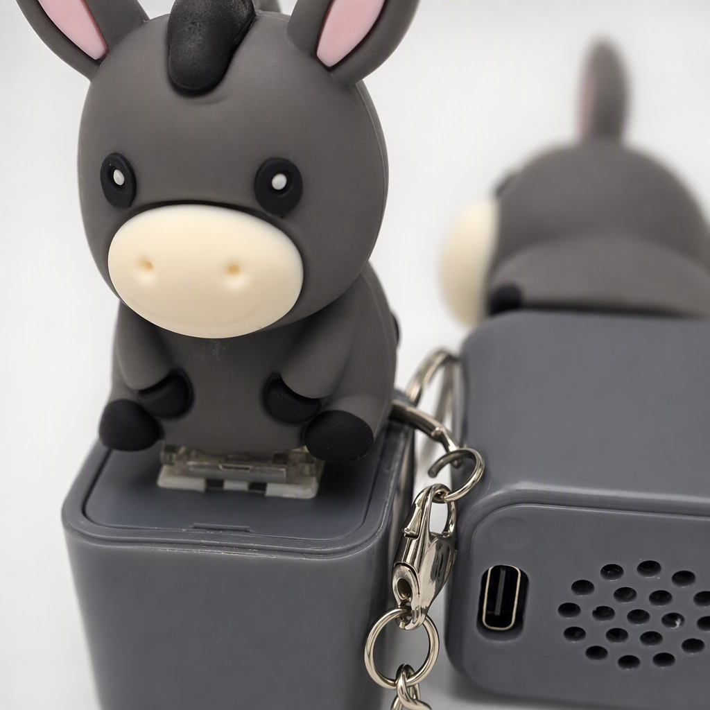Creative grey donkey-shaped portable power bank with large capacity and multiple functions, a must-have fashionable and trendy travel item Application Scenario