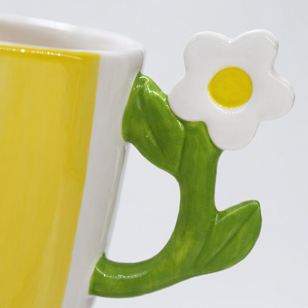 Yellow and white striped ceramic cup with daisy-shaped green handle, creative coffee water cup, household daily necessities Application Scenario